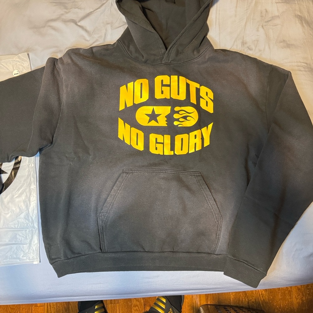 Black Hoodie with Yellow 'No Guts No Glory' Graphic